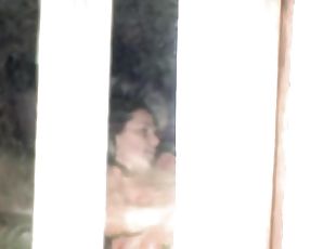Female spied masturbating through the window of her bedroom