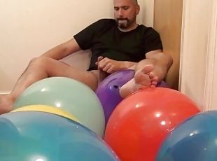 Balloon fetish play: blowing up, popping, squeeking, stomping and cumin on balloons: PREVIEW