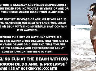 Sparkling fun at the beach with big red dragon dildo anal