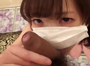 Japanese uncensored: young Asian in antiflue mask sucking cock