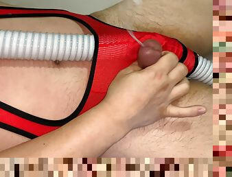 Fat Man Wearing Red Lingerie Rubbing A Small Penis On a Vacuum Hose And Then Cumming