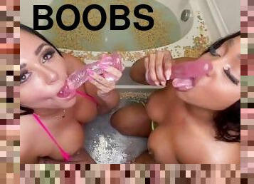 Two hot girls Deep throating dildos