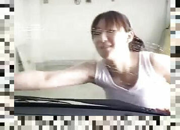 Asian girl car washing