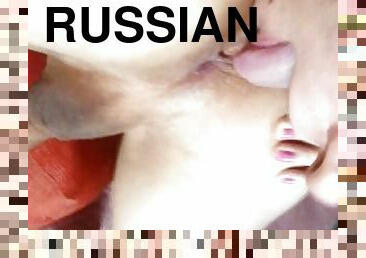 Russian girl in a mask shows her tongue in a boy's cute ass