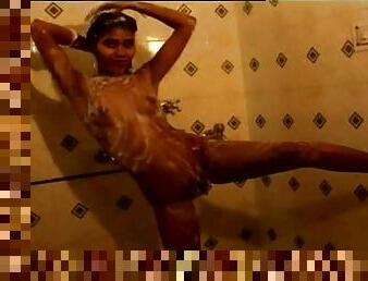 Teen Indian dances all wet in the shower