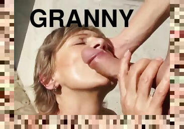 Granny with a perfect body sucking cock outdoors