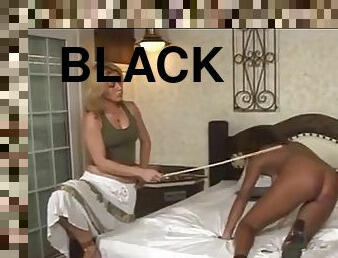 Lesdom black spanking