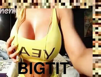 Big tits babe strips