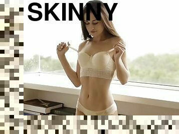 Skinny brunette teen edessa g showcases her small tits