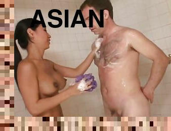 Asian masseuse Tia Ling is wanking a dick
