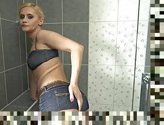 Mature babe masturbating in the shower