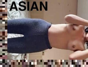 Asian teen plays with her nice ass and boobs