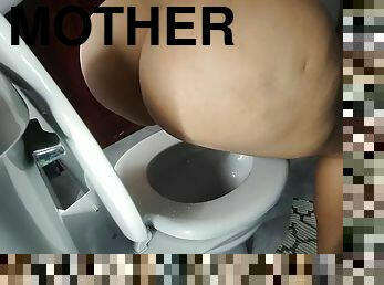 Stepmother caught urinating in the bathroom of her room