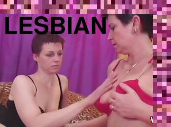 Lesbians playing with dildo and toy