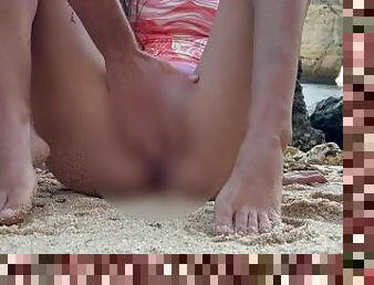 Squirting on the beach