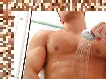 Beautifull jock gets filmed horny in a shower.
