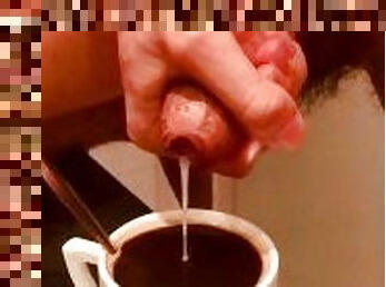 Massive cumshot in a cup of coffee