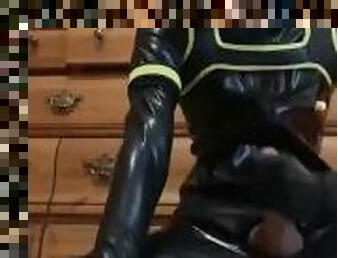 Latex rubber pup cums a huge load