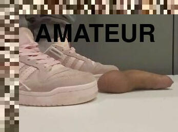 trampling in pink sneakers