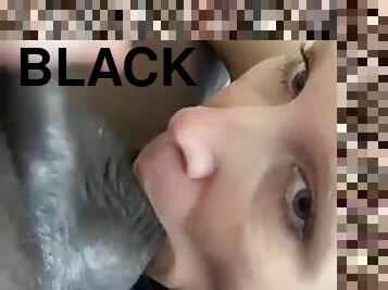 Licking and sucking his black balls makes me so wet