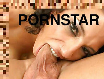 Curly pornstar gives hot oral