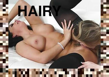 Hairy muff lesbo in stockings being pussyeaten 69
