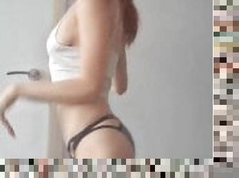 Swedish redhead Redbonanza stripteasing