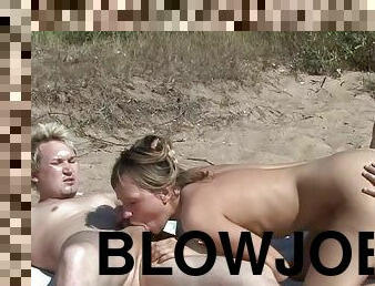 Tanned bitch is banging on the beach