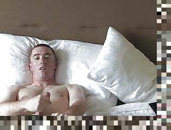 Solo soldier relaxes on his bed while jerking off