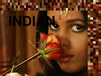 Erotic Indian chick is playing with flowers