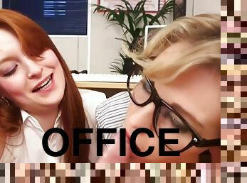 Two bitches suck dick in the office