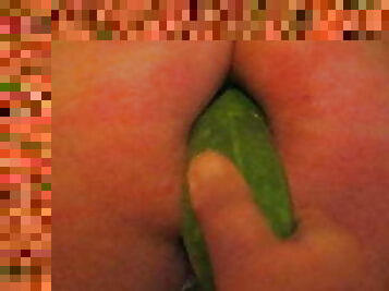 Slave is humiliated by inserting cucumber in its holes 2