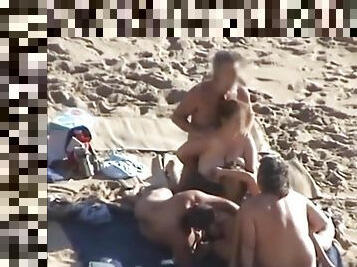 Group sex at a nudist beach