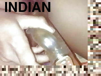 INDIAN VILLAGE WIFE MASTURBATING WITH A DILDO 
