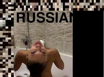 Russian whore fucks herself in the ass with a dildo