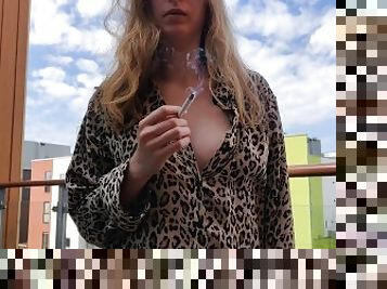 Smoking on the balcony in my leopard PJs