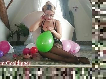 Big eyeglasses and big balloons