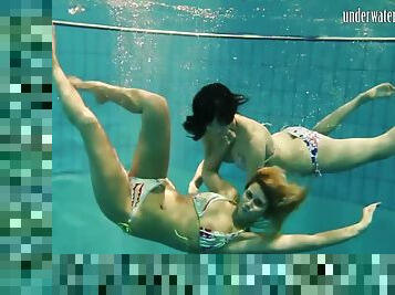 Girls Andrea And Monica Stripping One Another Underwater