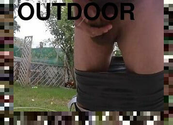 Hot guy pulling out his cock outdoors and jerking it off
