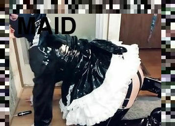 Sissy maid sucks dildo while fucked by machine