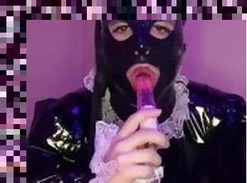 Sexy latex sissy maid sucks dildo and plays with chastity