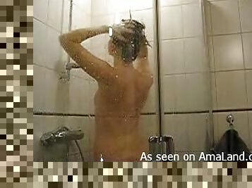 Lovely girl wet in the shower