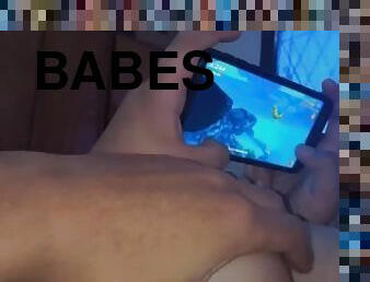 Touching my beautiful babe's big tits while playing video games on her cell phone