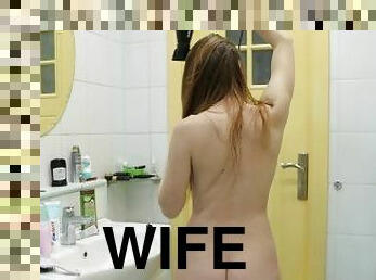 Watching My Naked Wife blow-dry her hair.