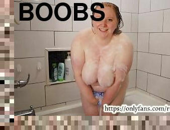 BBW redhead enjoying a hot shower