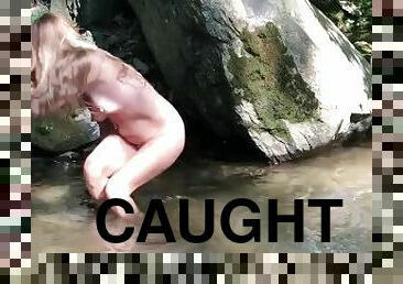 NAKED BLONDE CAUGHT NAKED IN CREEK