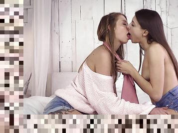 Lesbian teens kiss and make out before using toys