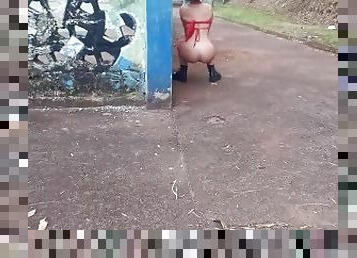 peeing and sucking in a public square