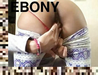 Ebony Slut masterbates in from of window