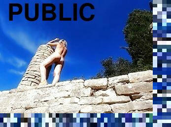 Naked girl at the ancient ruins